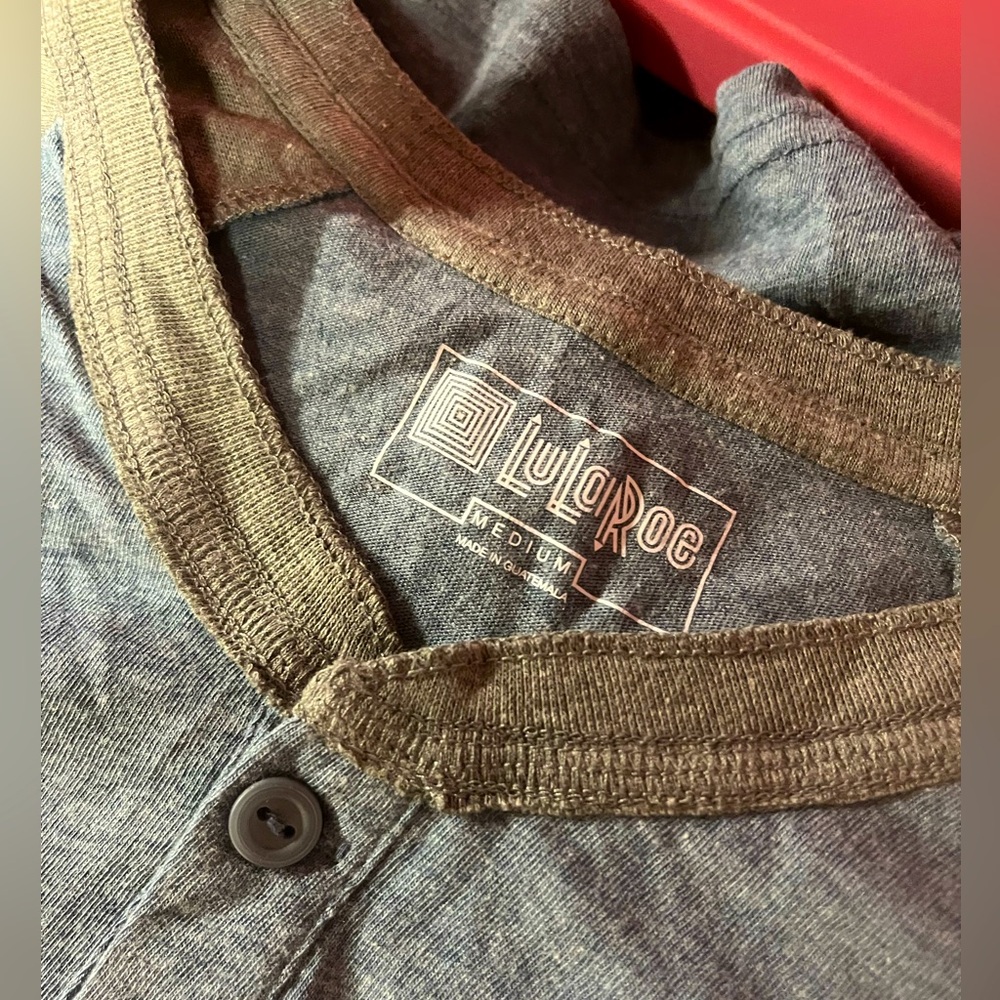 Medium size LuLaRoe man’s T-shirt with button-down halfway